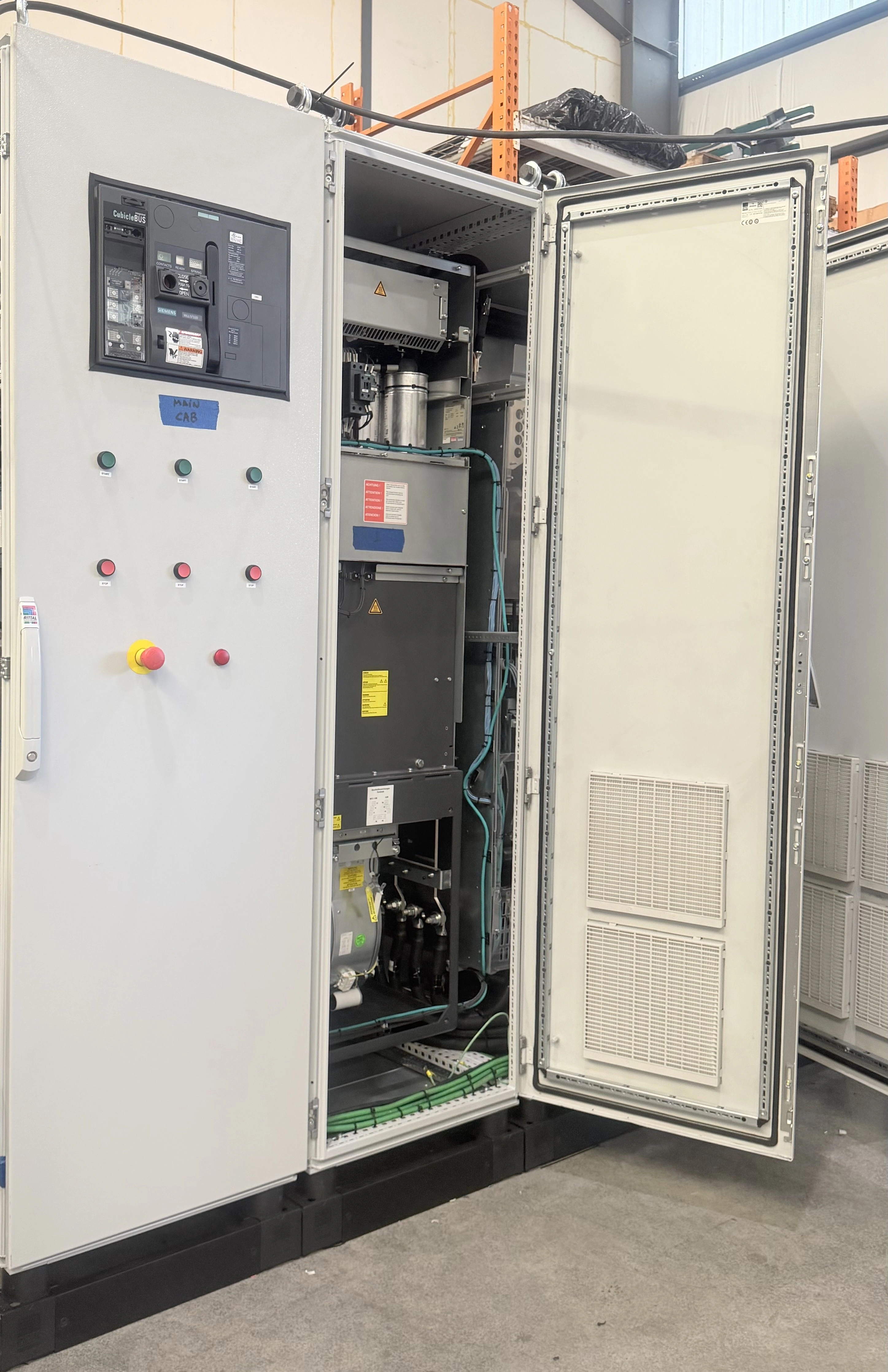 Industrial drive cabinet with its equipment compartment open