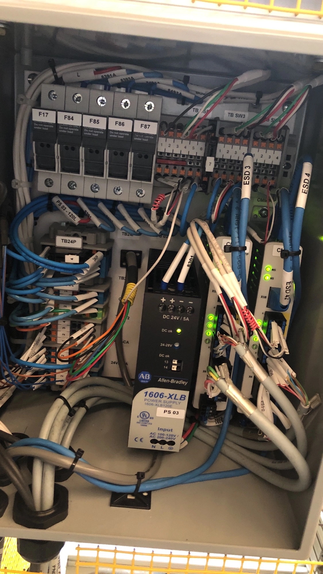 Power and control wiring inside an industrial junction box